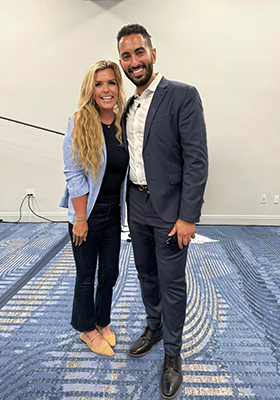 Photo of attorneys attending AI conference for lawyers