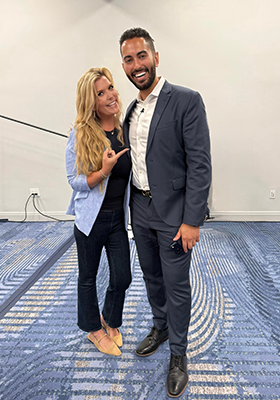 Photo of attorneys attending AI conference for lawyers
